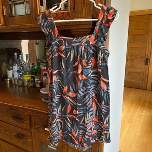 Summer dress with tropical leaves